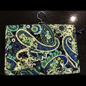 A Vera Bradley travel Jewelry organizer.